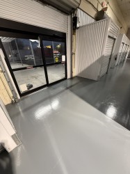 Endura-Plate topcoat over damaged tile floors by entrance.